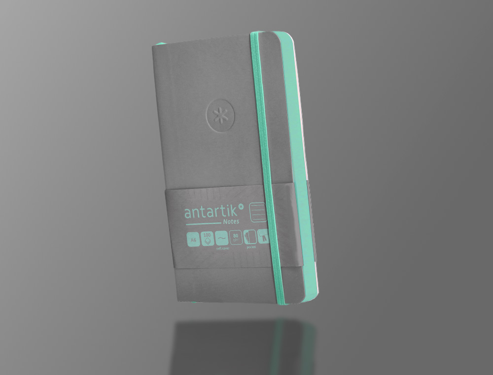 CUADERNO CON GOMILLA ANTARTIK NOTES TAPA BLANDA A6 RAYAS GRIS Y TURQUESA 100 HOJAS 80 GR FSC