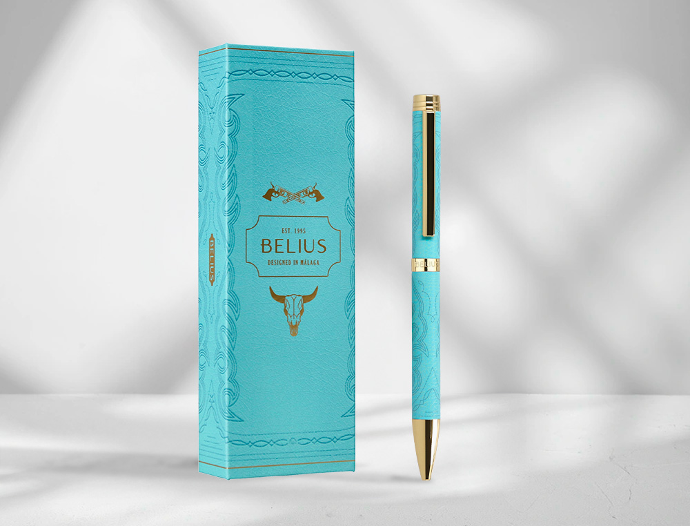 BOLIGRAFO BELIUS WILD WEST ALUMINIO COLOR TURQUESA DORADOTINTA COLOR AZUL CAJA DE DISEO